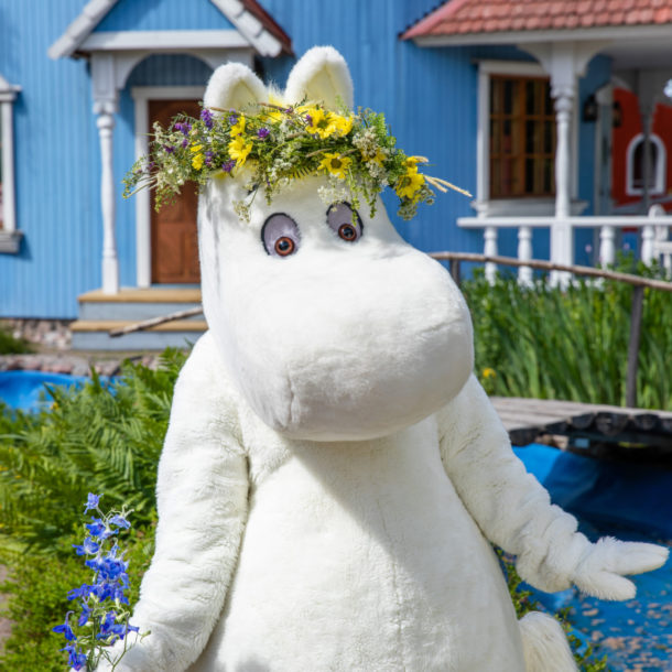 Snorkmaiden in front of the Moominhouse